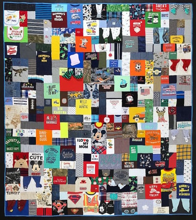 Baby clothes quilt with pj feet by Too Cool T-shirt Quilts